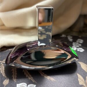 Calvin Klein Euphoria Eau de parfum. 1.6 ounces minus a few small sprays.